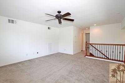 37430 Blackburn Road Indio, CA 92203 - Photo 12 of 17 a view of a livingroom with a ceiling fan and window