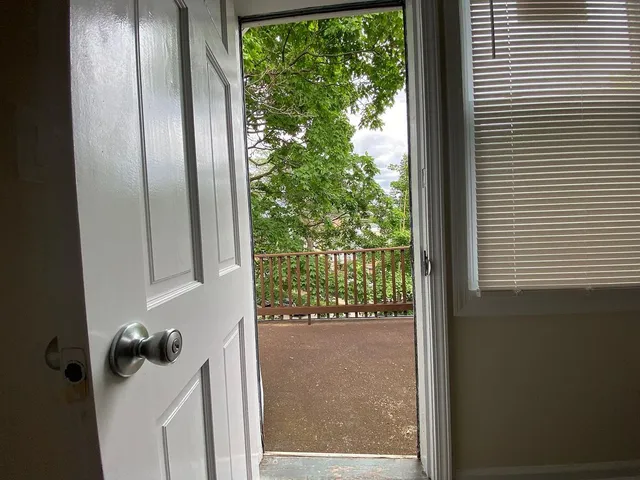 a view of a porch of a house