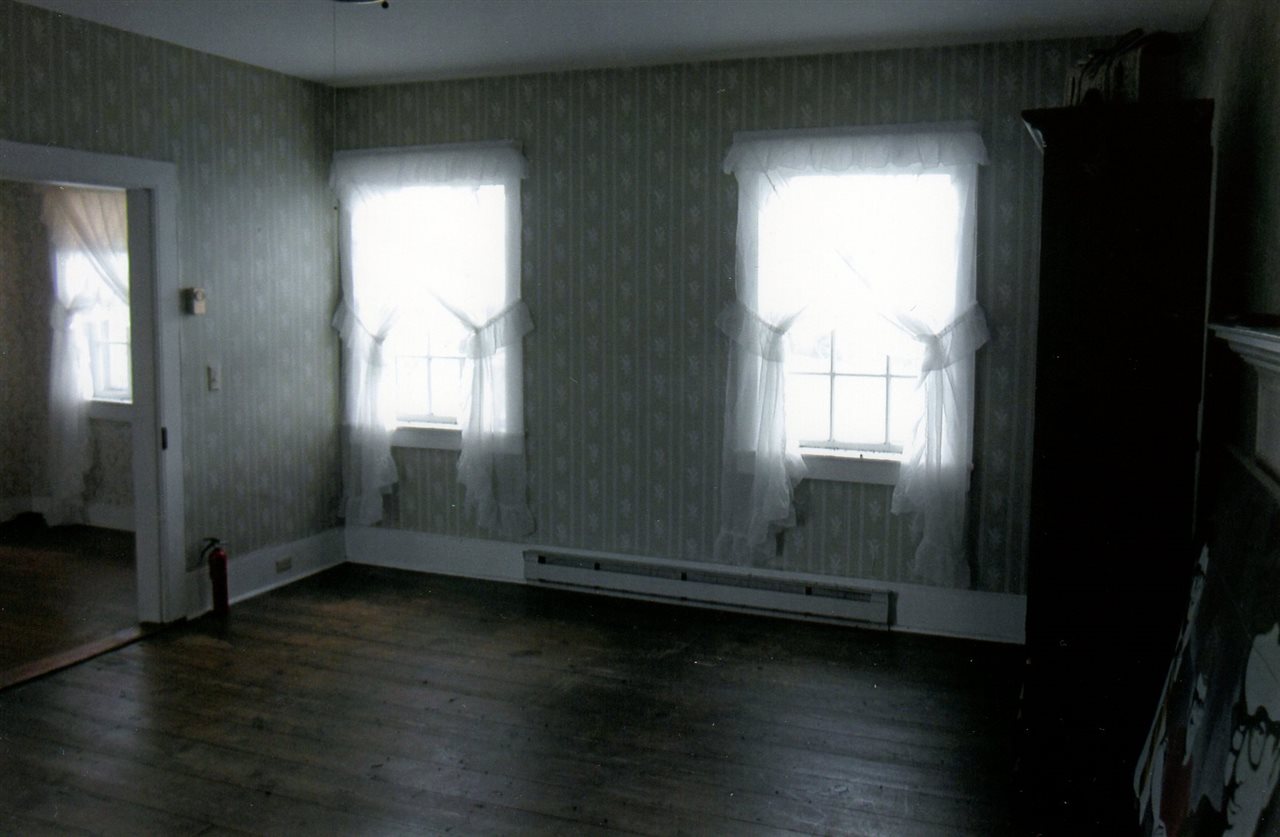 258 Red Hill Road Fairfield, VA 24435 - Photo 18 of 47 an empty room with wooden floor and windows