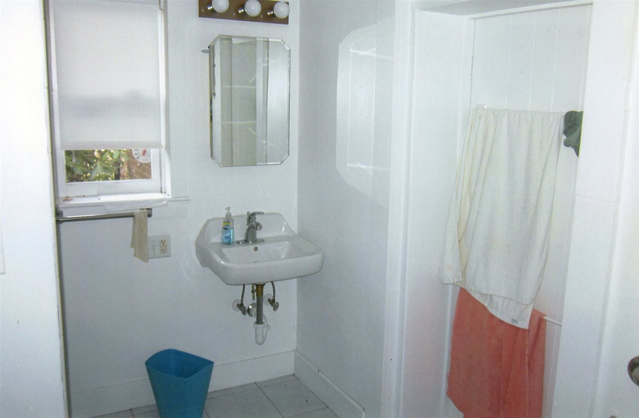 258 Red Hill Road Fairfield, VA 24435 - Photo 27 of 47 a bathroom with a sink a toilet and mirror