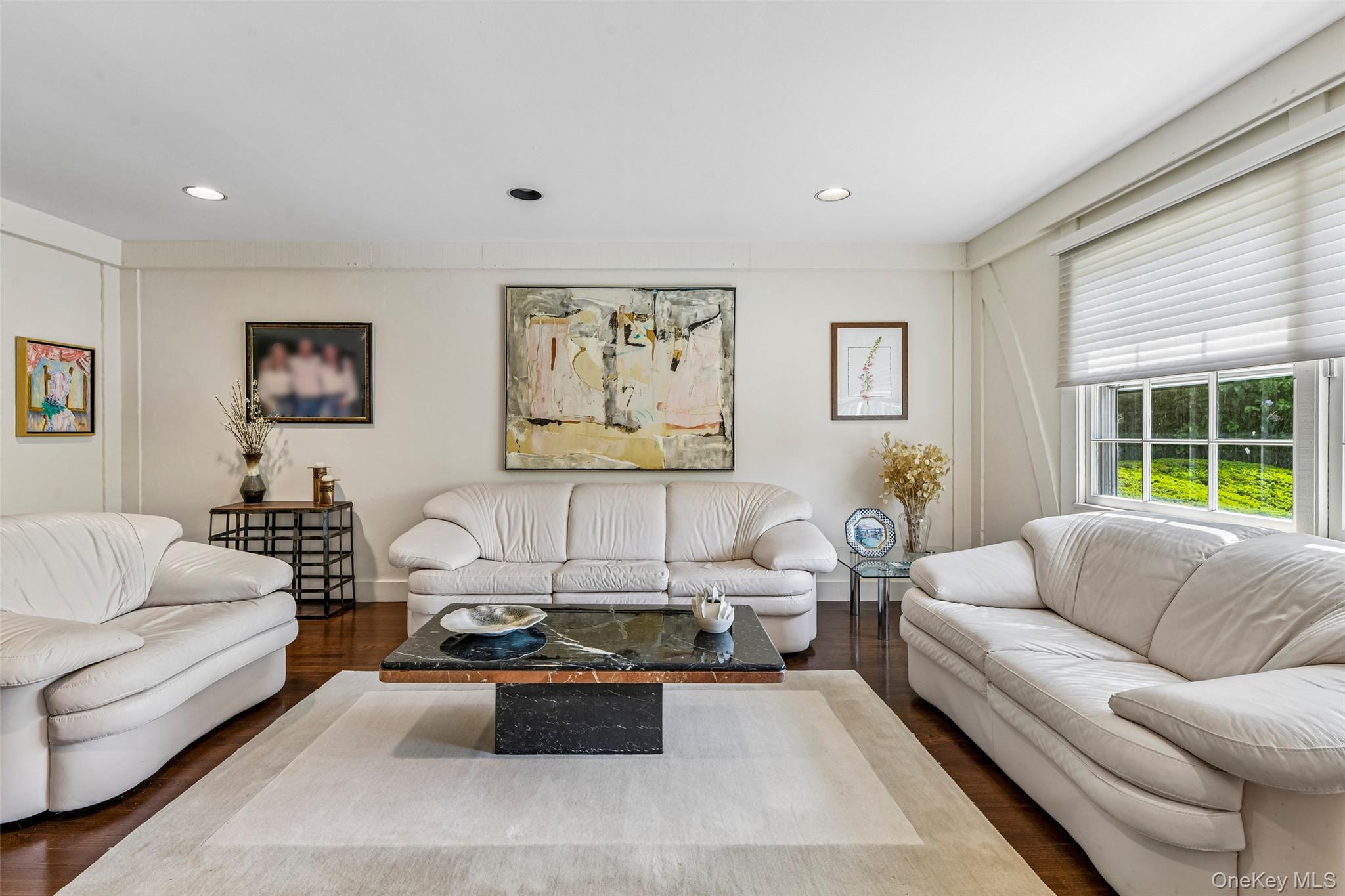 100 Hewlett Neck Road Woodmere, NY 11598 - Photo 10 of 45 a living room with furniture and a large window