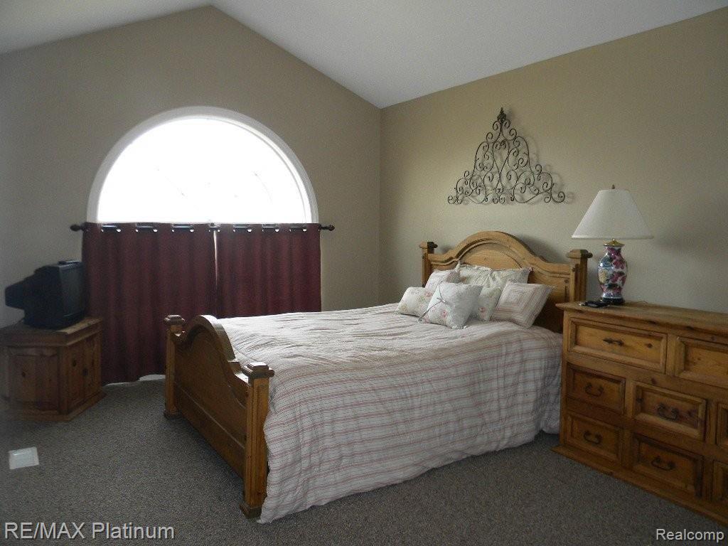 2723 Black Eagle Ridge Howell, MI 48843 - Photo 18 of 25 Cathedral Guest Bedroom