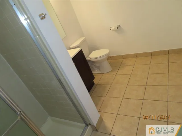 a bathroom with a sink and toilet