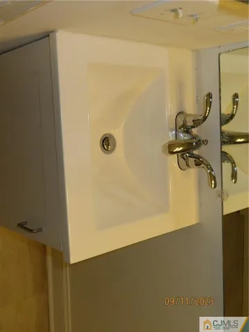 a bathroom with a toilet and shower