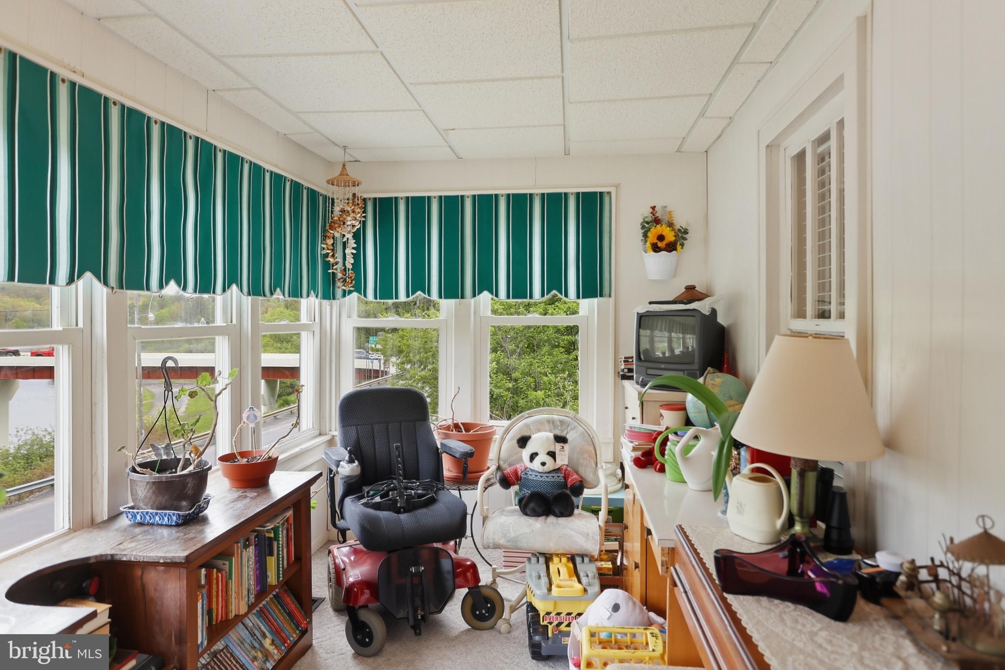 378 Spruce Street Thomas, WV 26292 - Photo 25 of 30 a room with furniture and a large window