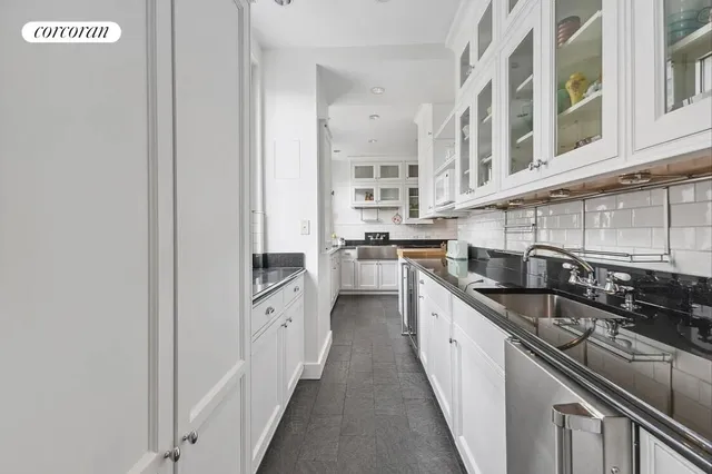 a living room with furniture window and wooden floor