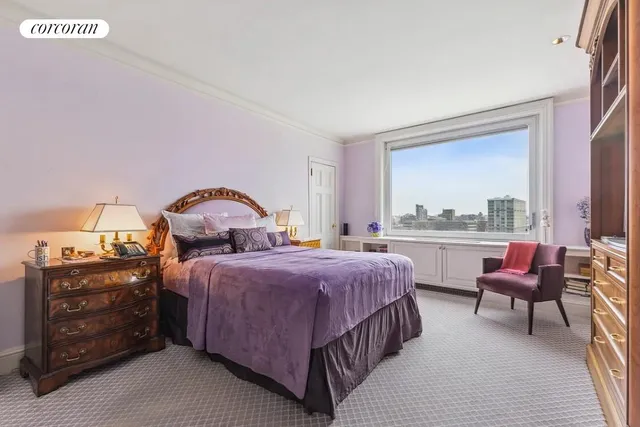 a large white kitchen with a stove and a refrigerator