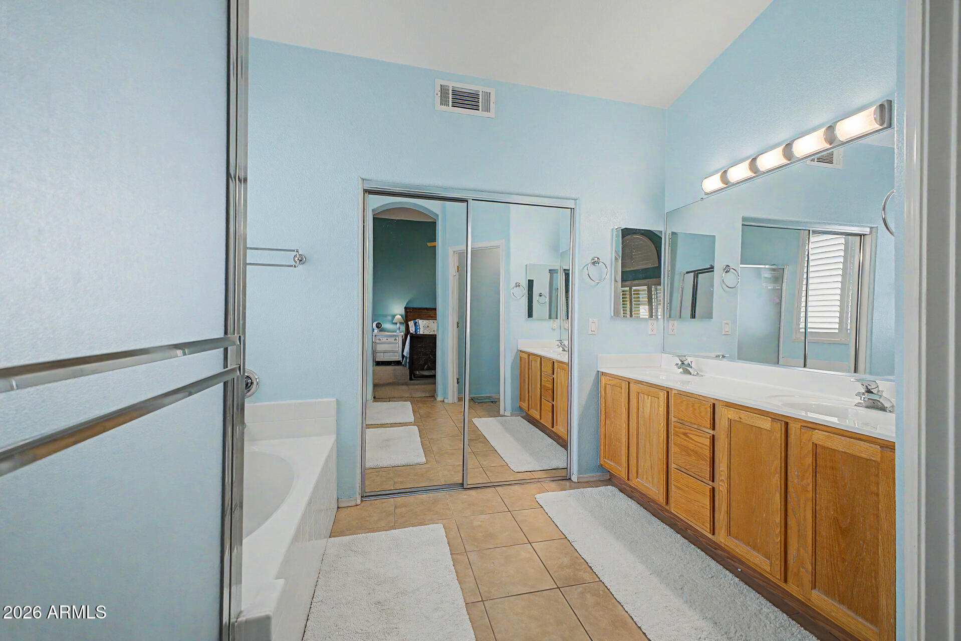 3425 South Loback Lane Gilbert, AZ 85297 - Photo 21 of 52 a large bathroom with a tub and shower