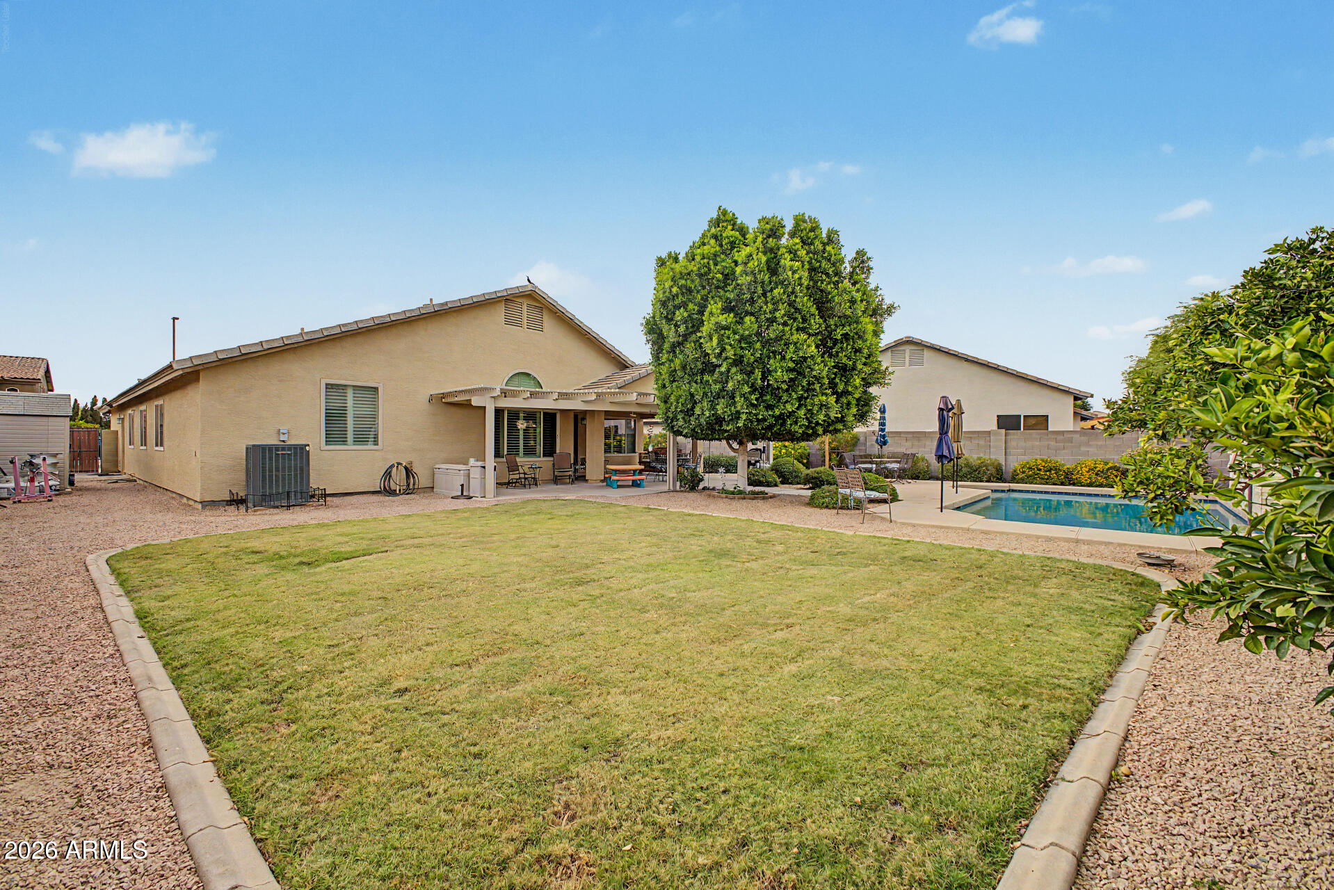 3425 South Loback Lane Gilbert, AZ 85297 - Photo 40 of 52 a front view of house with yard