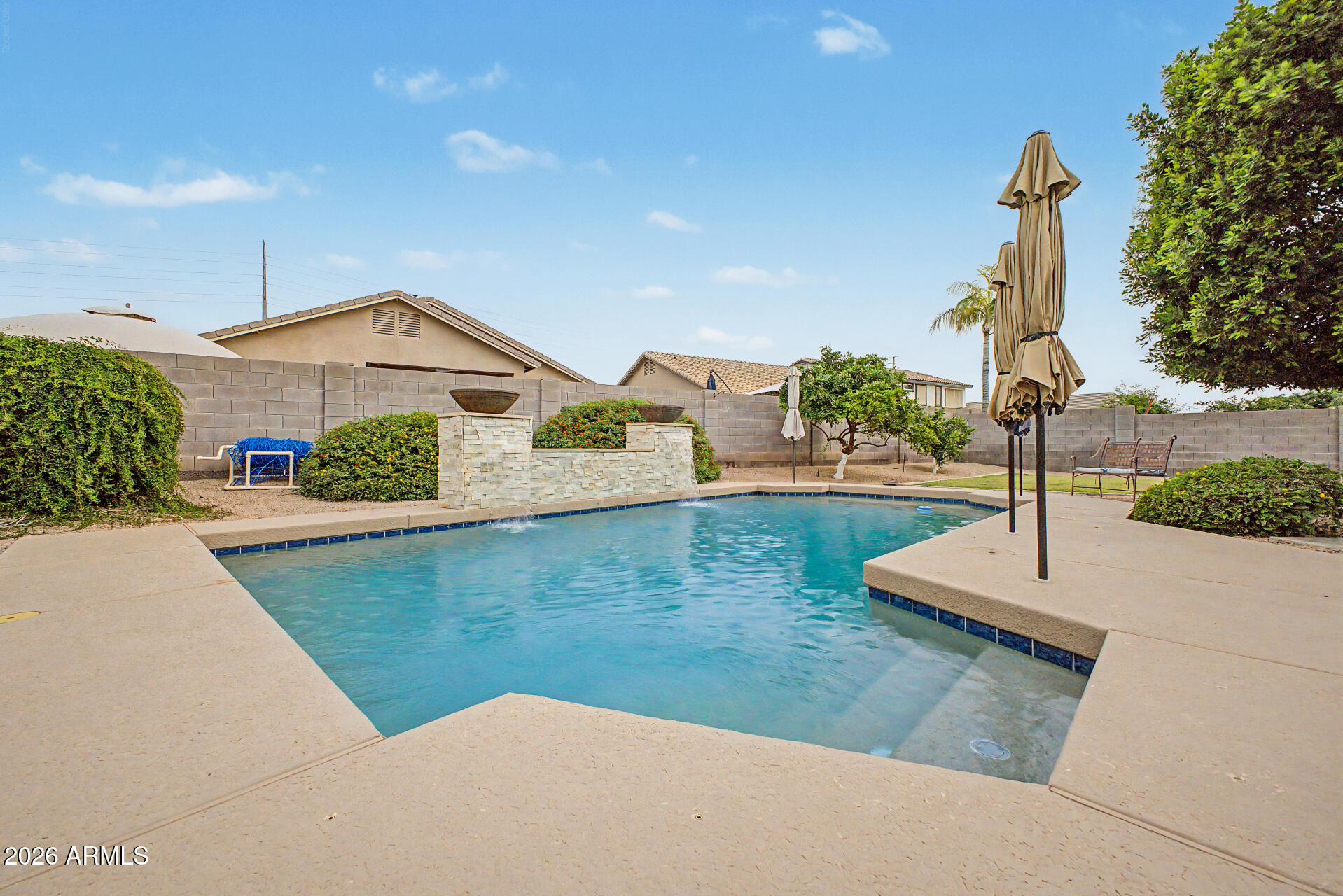 3425 South Loback Lane Gilbert, AZ 85297 - Photo 47 of 52 a view of a house with a yard and potted plants