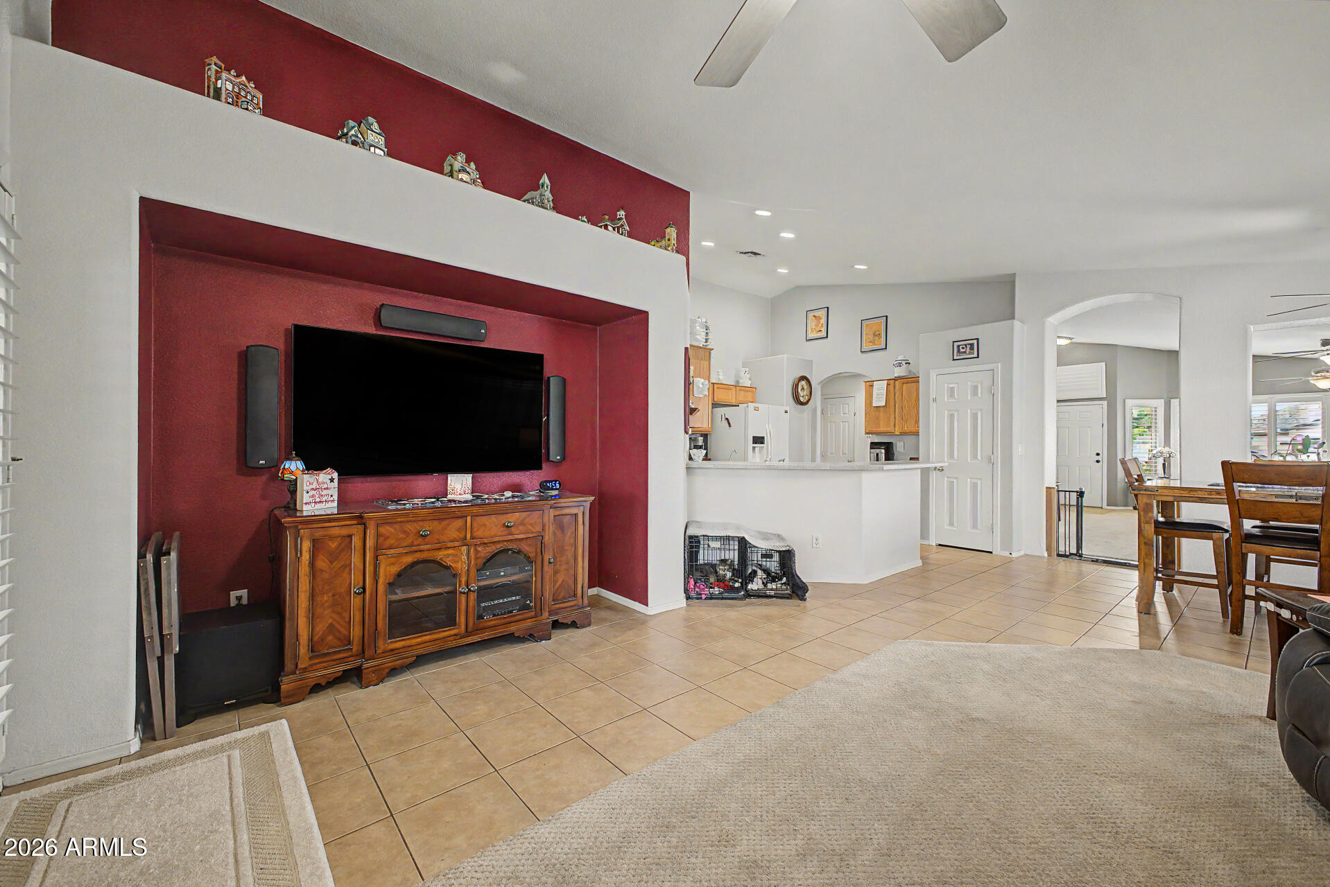 3425 South Loback Lane Gilbert, AZ 85297 - Photo 9 of 52 a living room with furniture and a flat screen tv