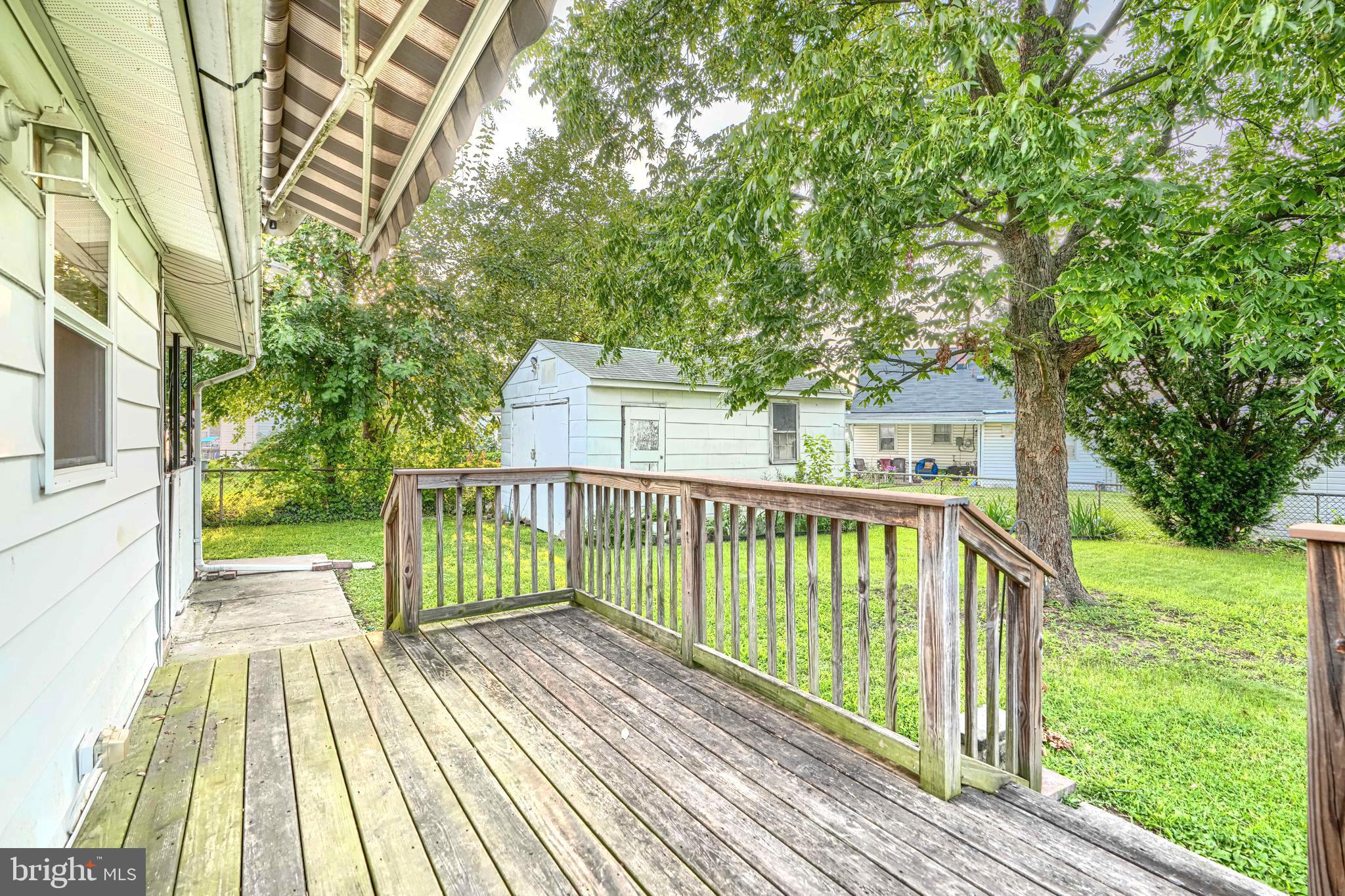 8206 Bullneck Road Baltimore, MD 21222 - Photo 26 of 33 Rear Deck w/SUNSETTER RETRACTABLE AWNING