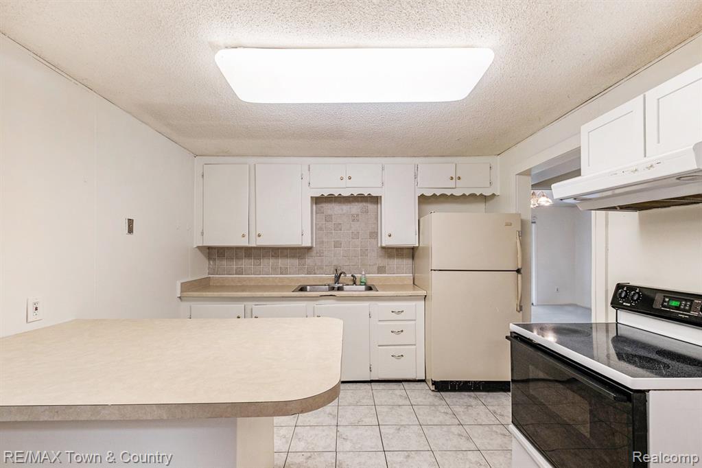 8476 Coldwater Road Flushing, MI 48433 - Photo 7 of 19