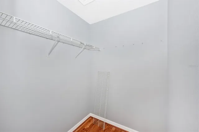 a view of a room with racks on the wall