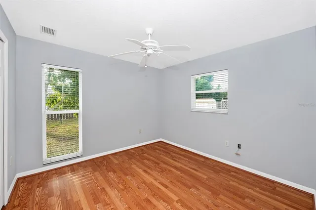 a view of an empty room with a window