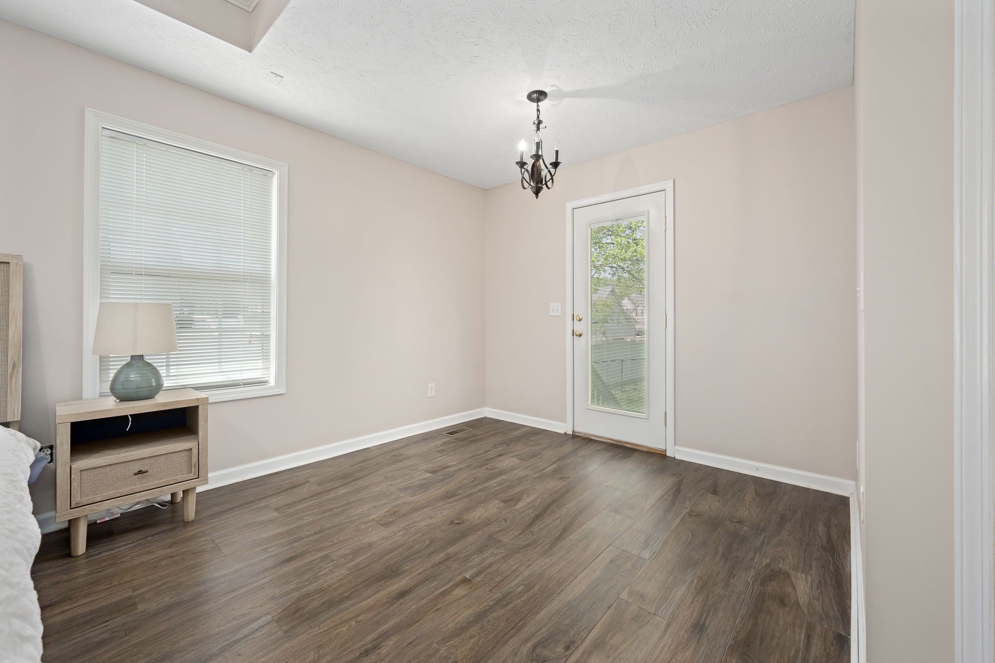 3620 Stevens Bend Drive Murfreesboro, TN 37127 - Photo 17 of 31 wooden floor in an empty room with a window