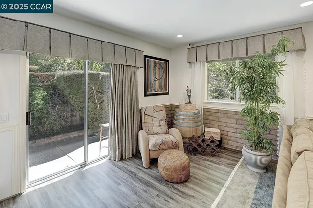 a view of a yard with a tree