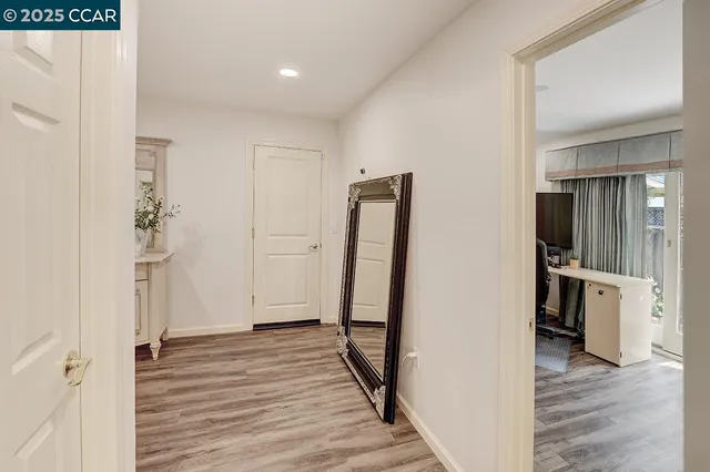 a spacious bathroom with a granite countertop sink a toilet and shower