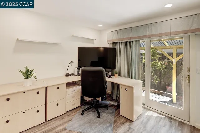 a bathroom with a sink a vanity and a mirror