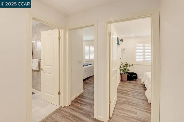 a bedroom with a bed and with furniture