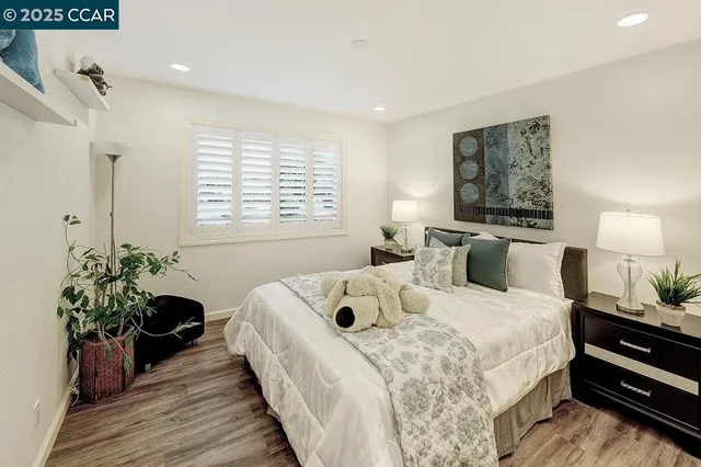 a bathroom with a shower and toilet