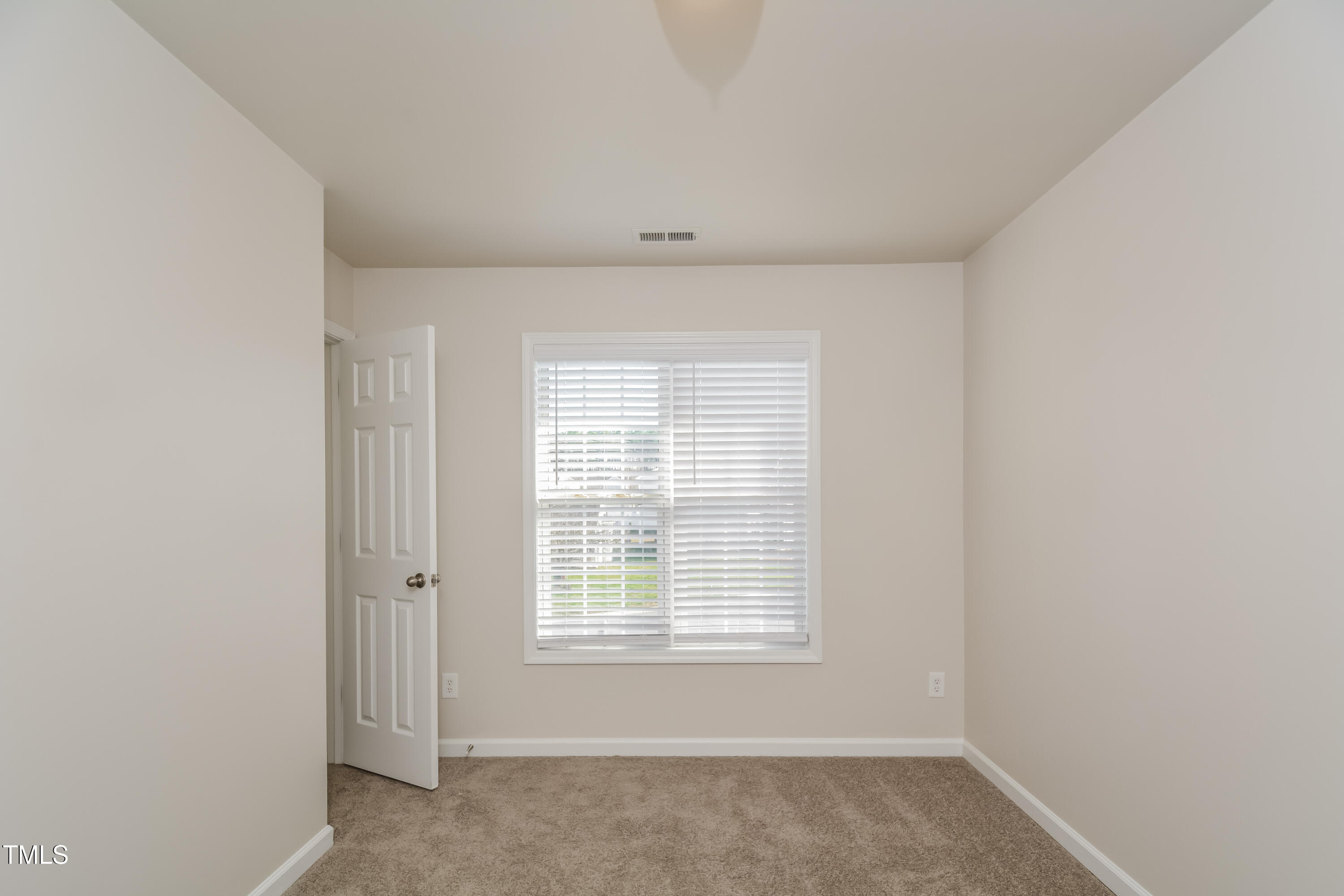 745 Southgate Drive Raleigh, NC 27610 - Photo 11 of 17 a view of a livingroom with a window
