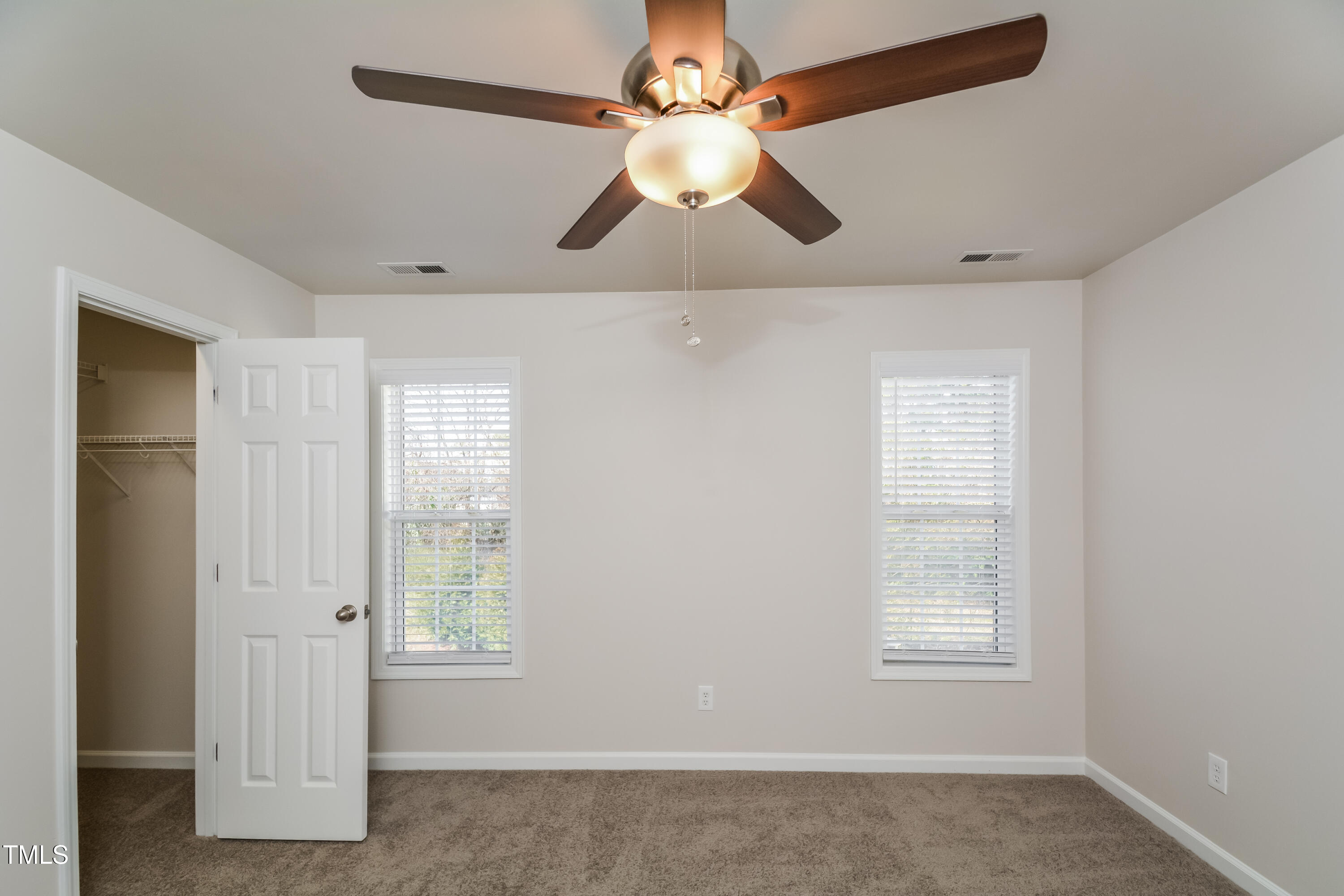 745 Southgate Drive Raleigh, NC 27610 - Photo 5 of 17 a view of an empty room with a window