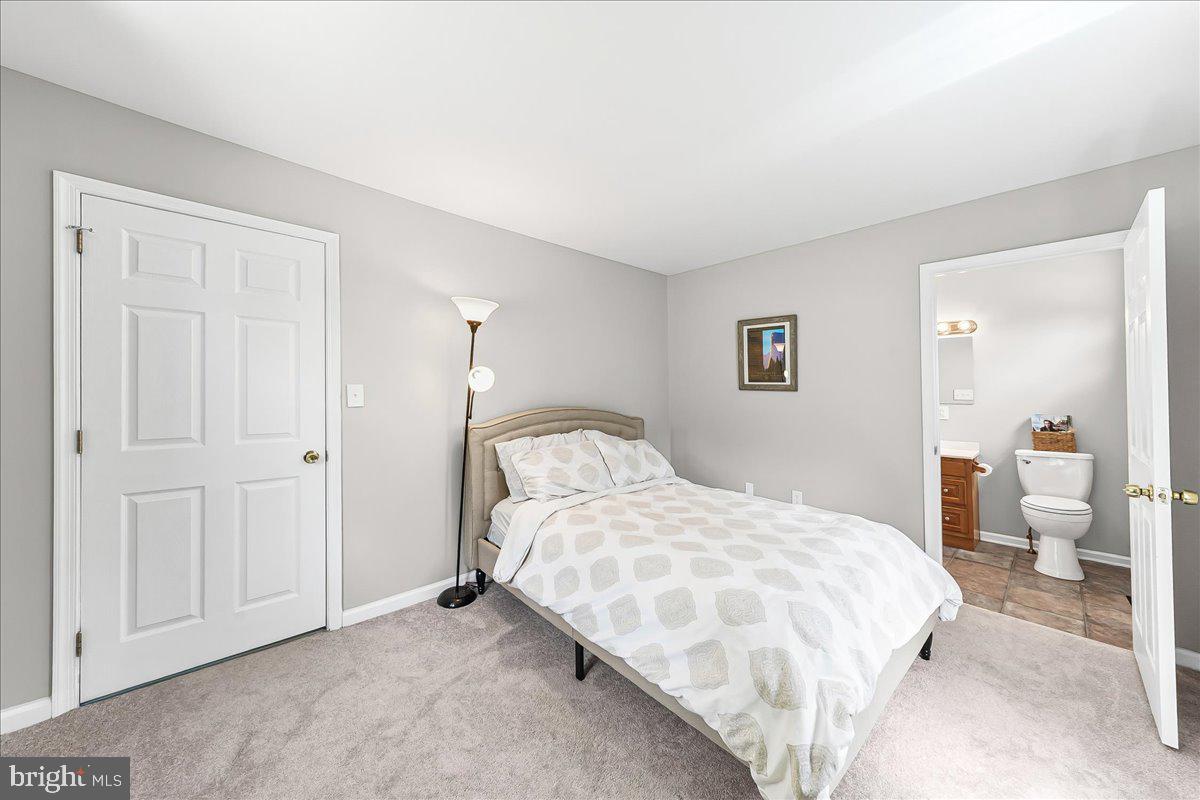 1019 Riverside Drive Pottstown, PA 19465 - Photo 17 of 36 Cozy bedroom with modern touches.