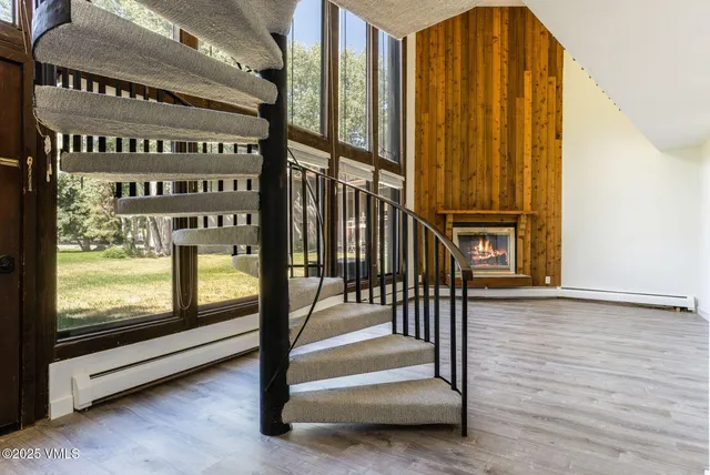 a bathroom with a shower and a bath tub