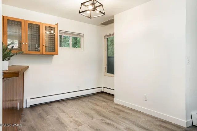 a front view of a house with a lake view