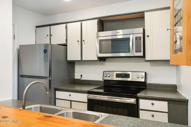 a view of a chairs and table on the terrace