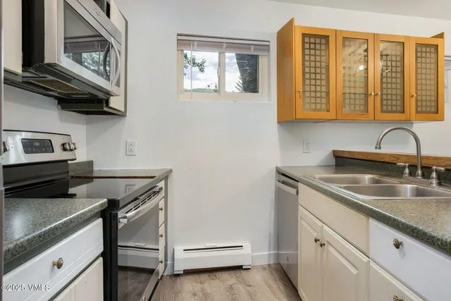 a view of swimming pool with a patio