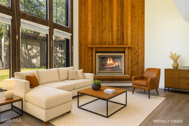 a bedroom with a bed and chair