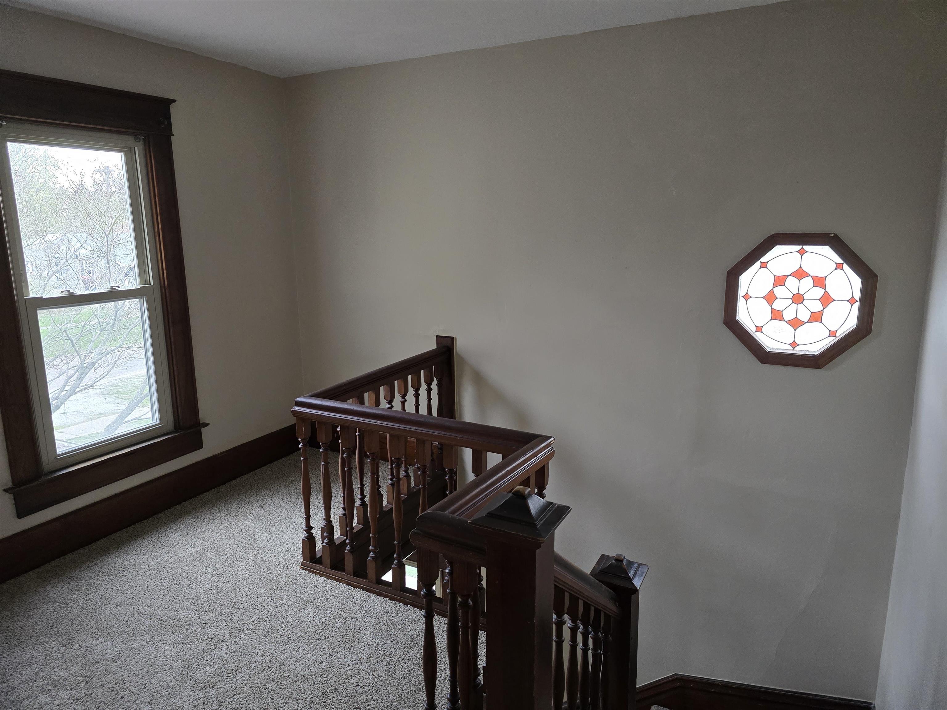 245 Cherry Street Carthage, IL 62321 - Photo 15 of 29 a view of staircase with window and stairs