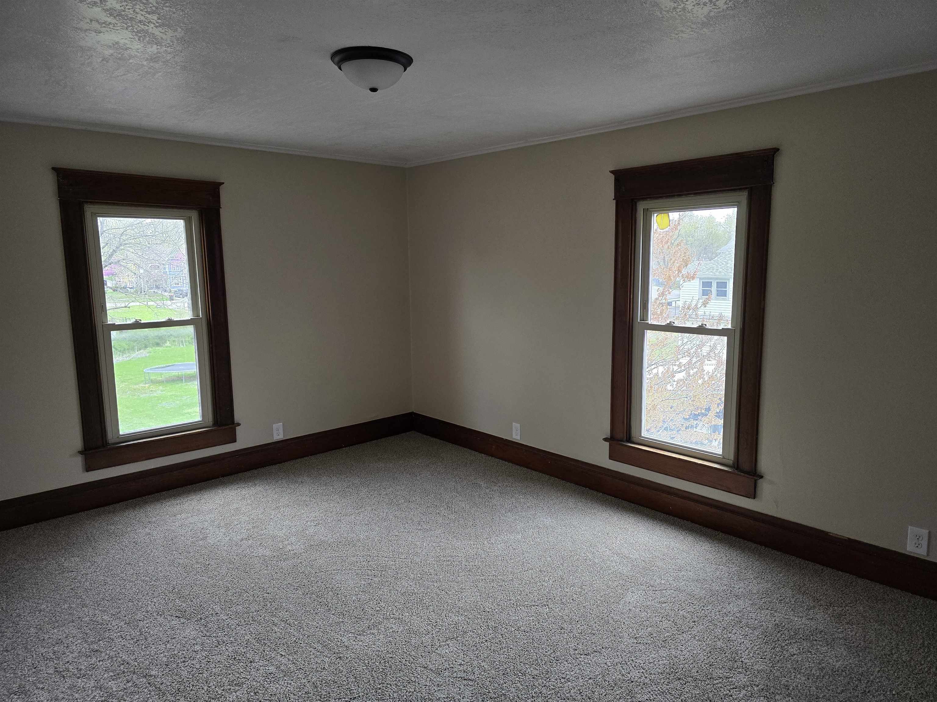 245 Cherry Street Carthage, IL 62321 - Photo 19 of 29 an empty room with a window