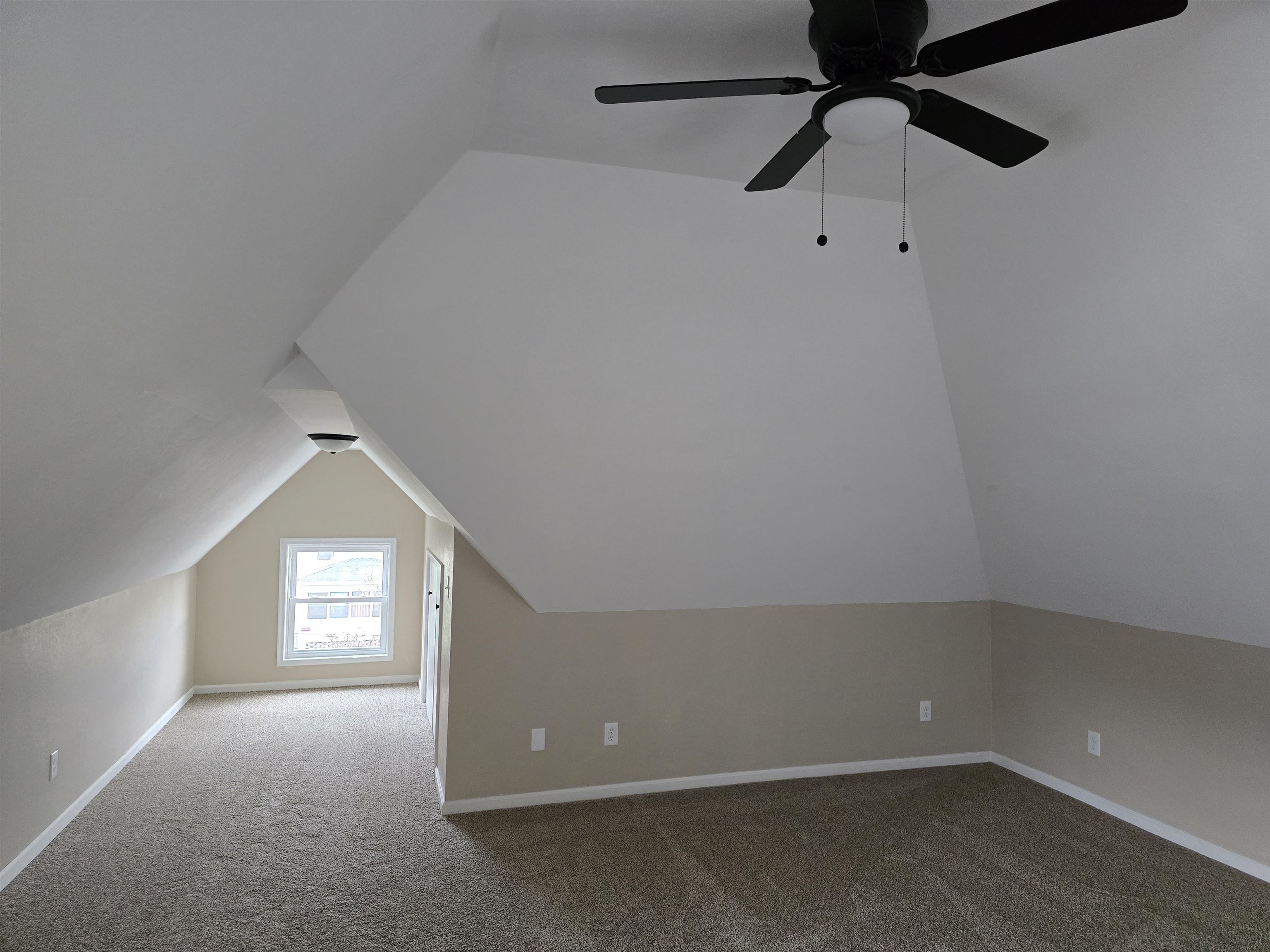 245 Cherry Street Carthage, IL 62321 - Photo 26 of 29 a view of an empty room with a window