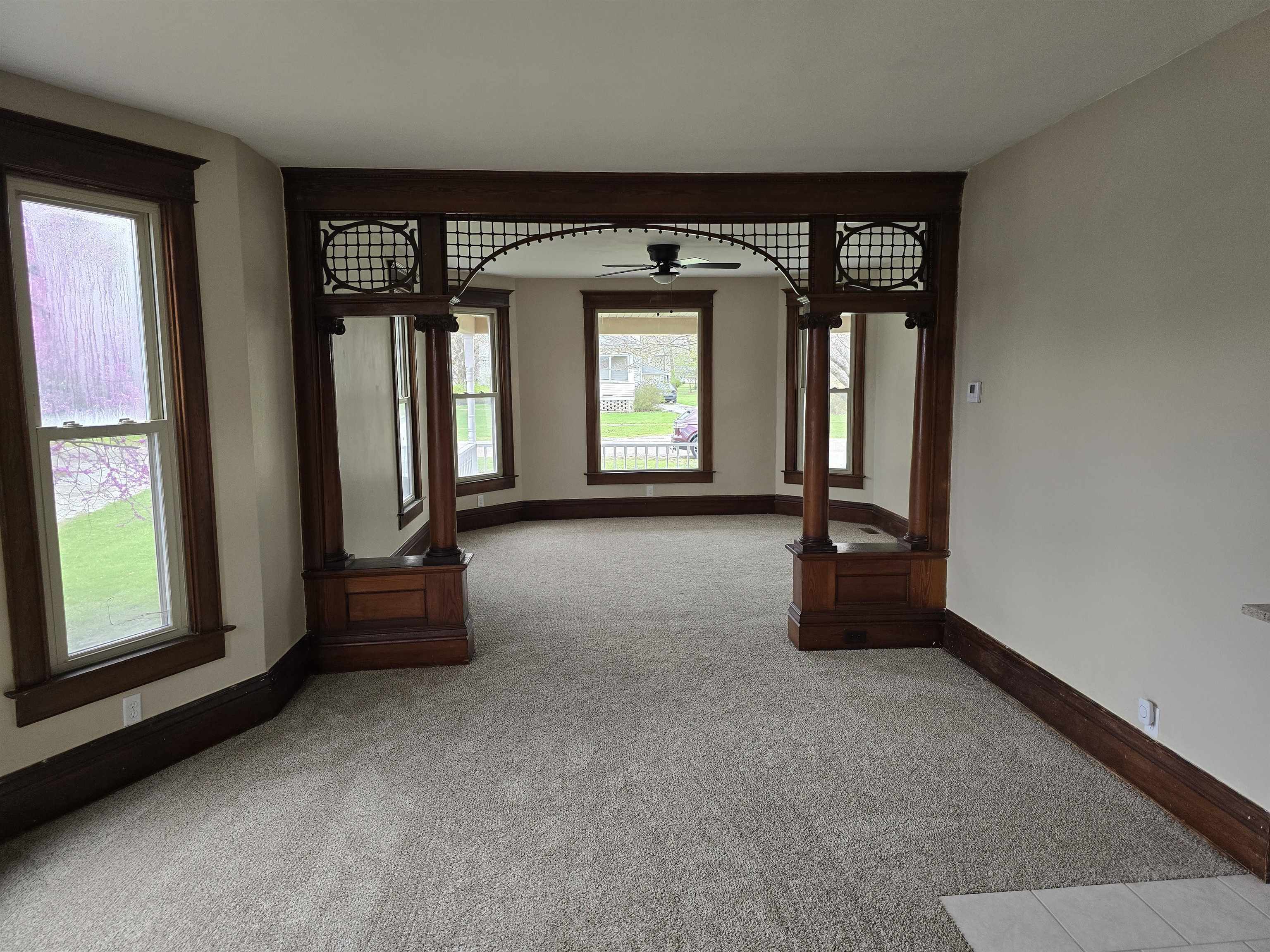 245 Cherry Street Carthage, IL 62321 - Photo 5 of 29 a view of a room with gym equipment and a large window