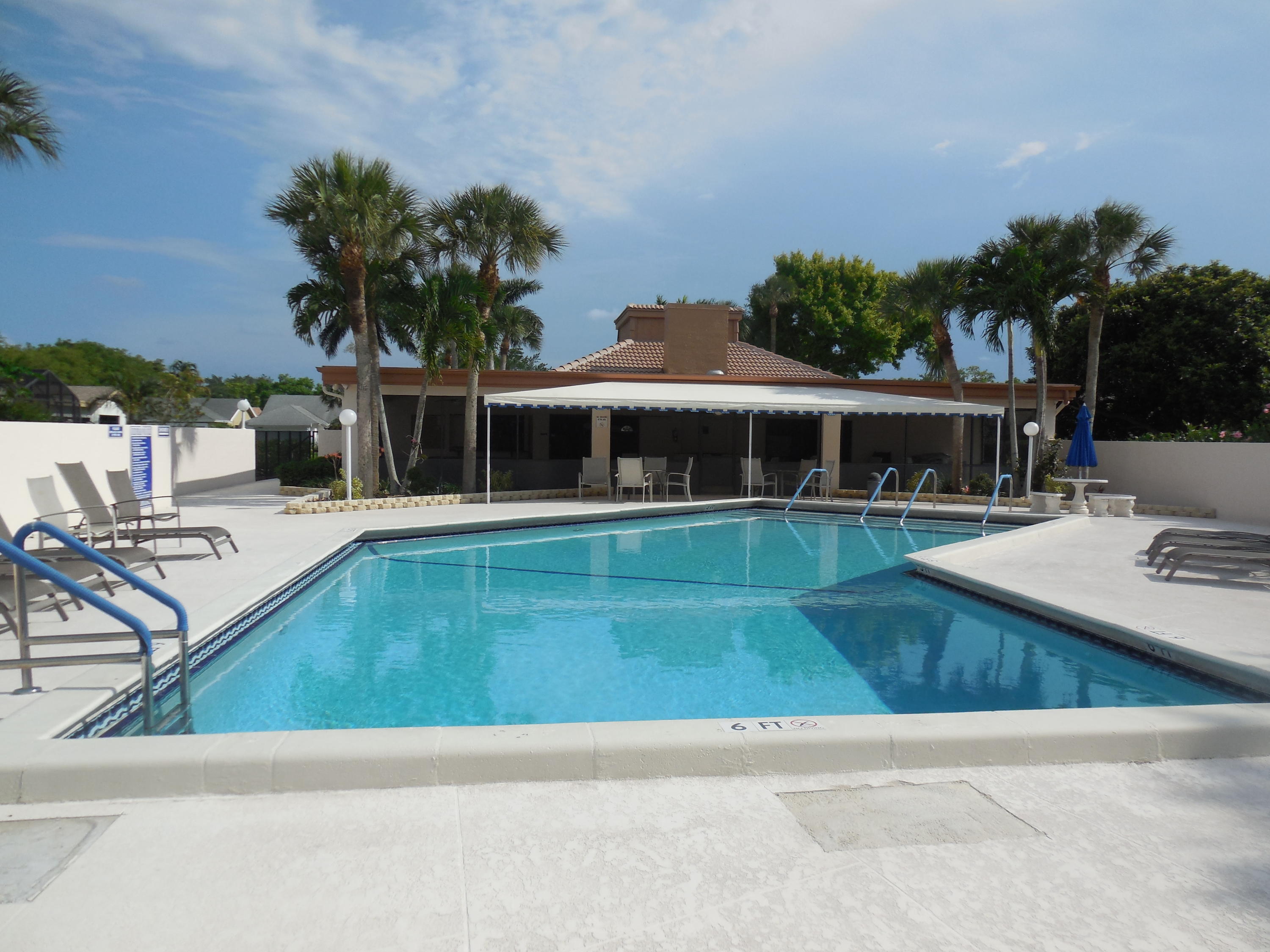 18090 104th Terrace South Boca Raton, FL 33498 - Photo 23 of 25 swimming pool view with a outdoor seating