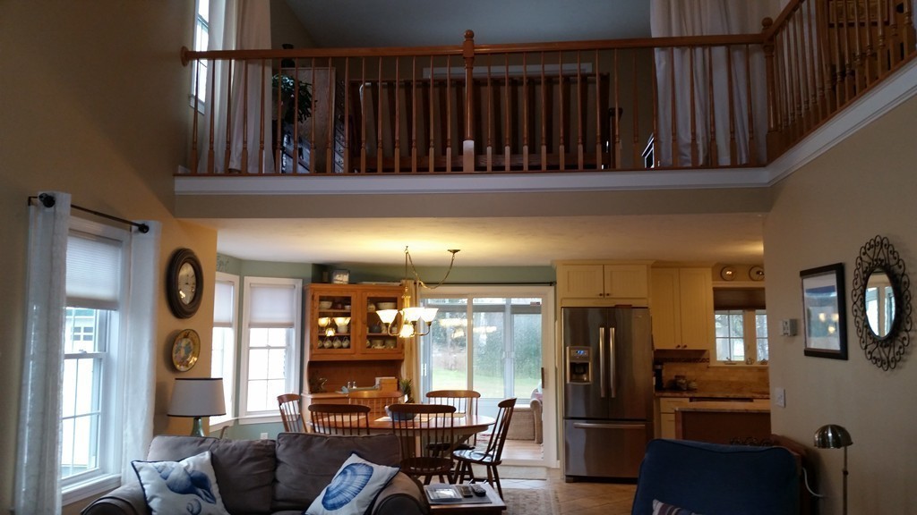 5 Bog Iron Road Wareham, MA 02576 - Photo 11 of 21 a view of a dining room with furniture