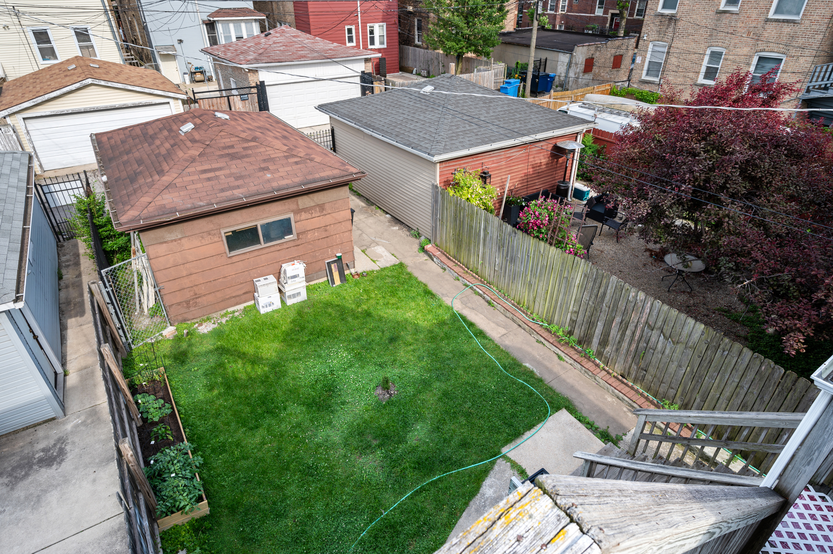 2109 North Karlov Avenue Chicago, IL 60639 - Photo 22 of 22 a aerial view of a house with a yard