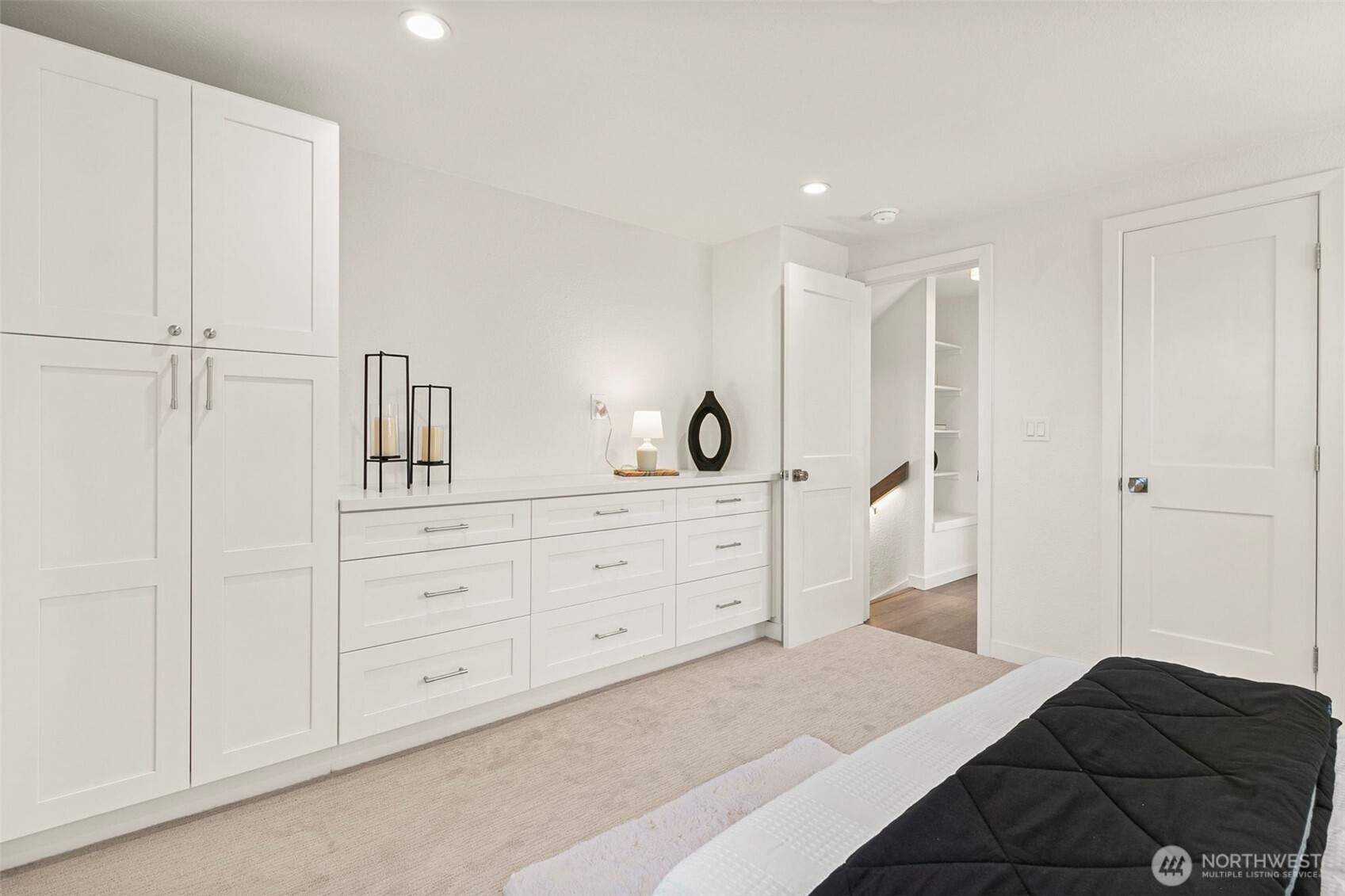12077 75th Avenue South Seattle, WA 98178 - Photo 18 of 35 a bedroom with a white bed and a dresser