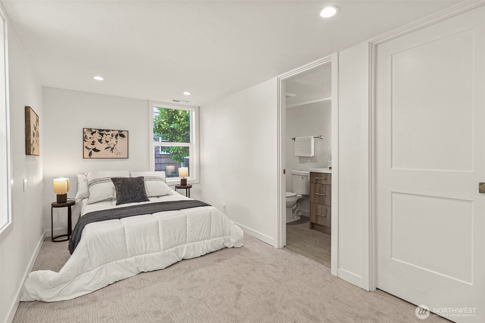 12077 75th Avenue South Seattle, WA 98178 - Photo 26 of 35 a bedroom with a bed and a lamp