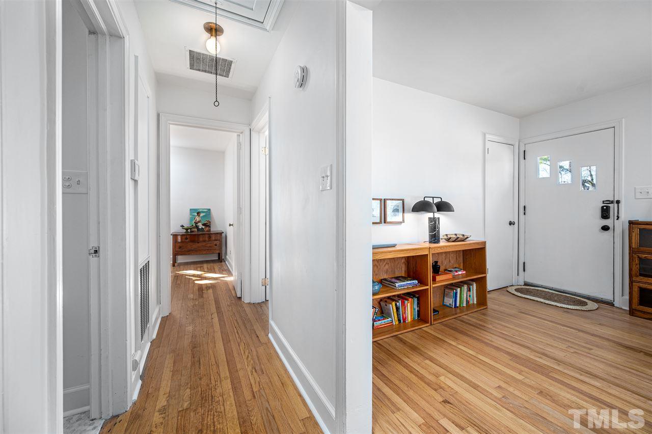 311 Dacian Avenue Durham, NC 27701 - Photo 14 of 30 a view of a room with wooden floor and furniture