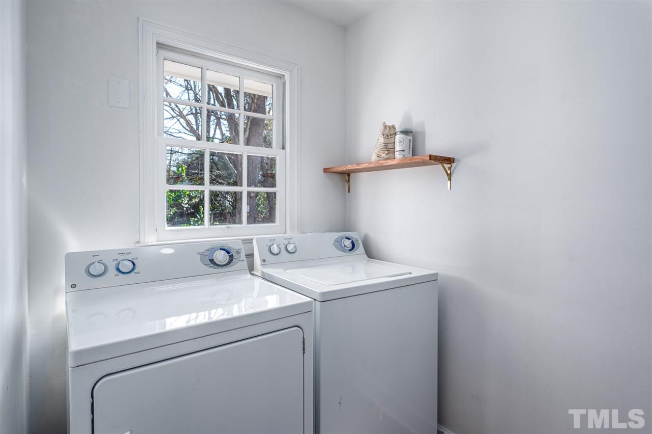 311 Dacian Avenue Durham, NC 27701 - Photo 23 of 30 a utility room with dryer and washer