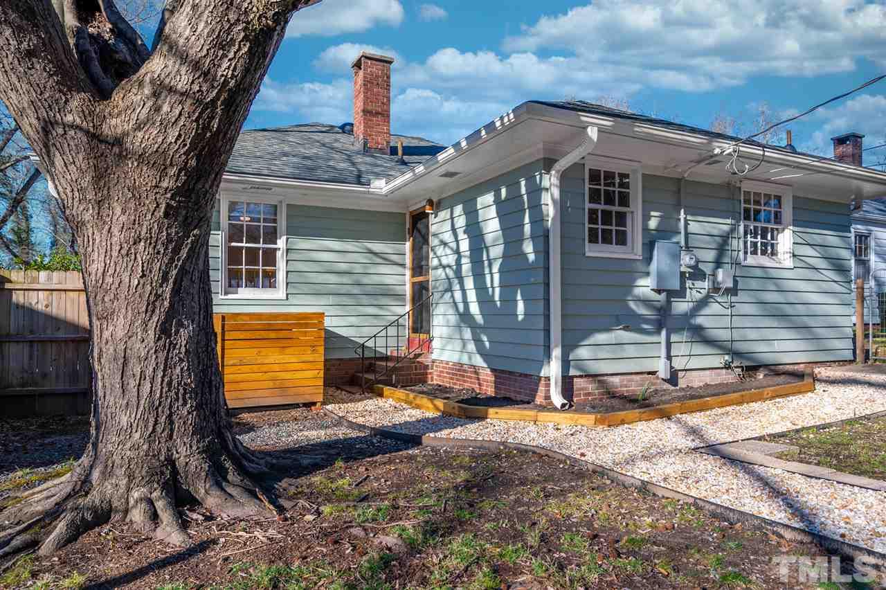 311 Dacian Avenue Durham, NC 27701 - Photo 26 of 30 a front view of a house with a yard