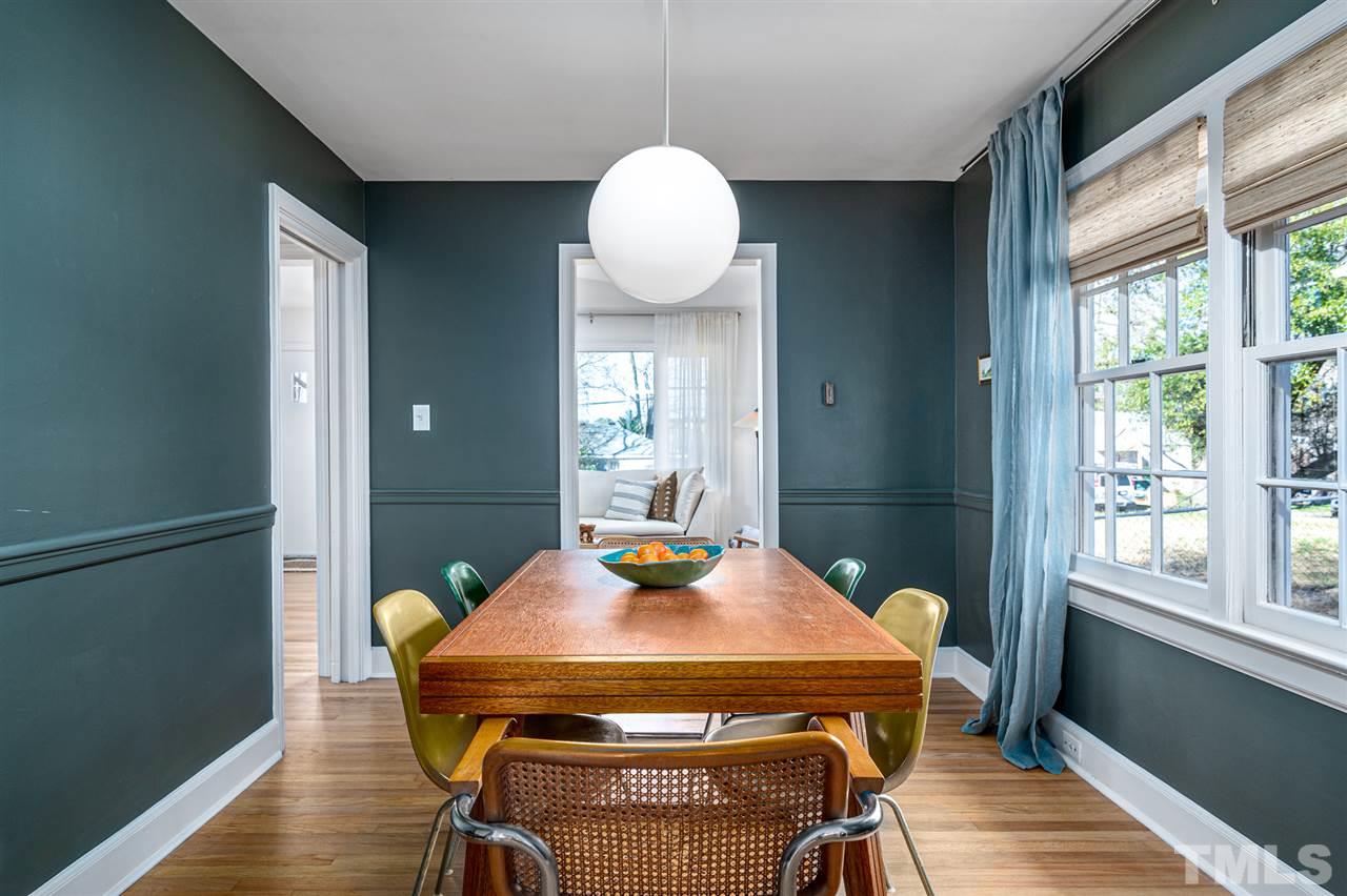 311 Dacian Avenue Durham, NC 27701 - Photo 7 of 30 a view of a dining room with furniture and window