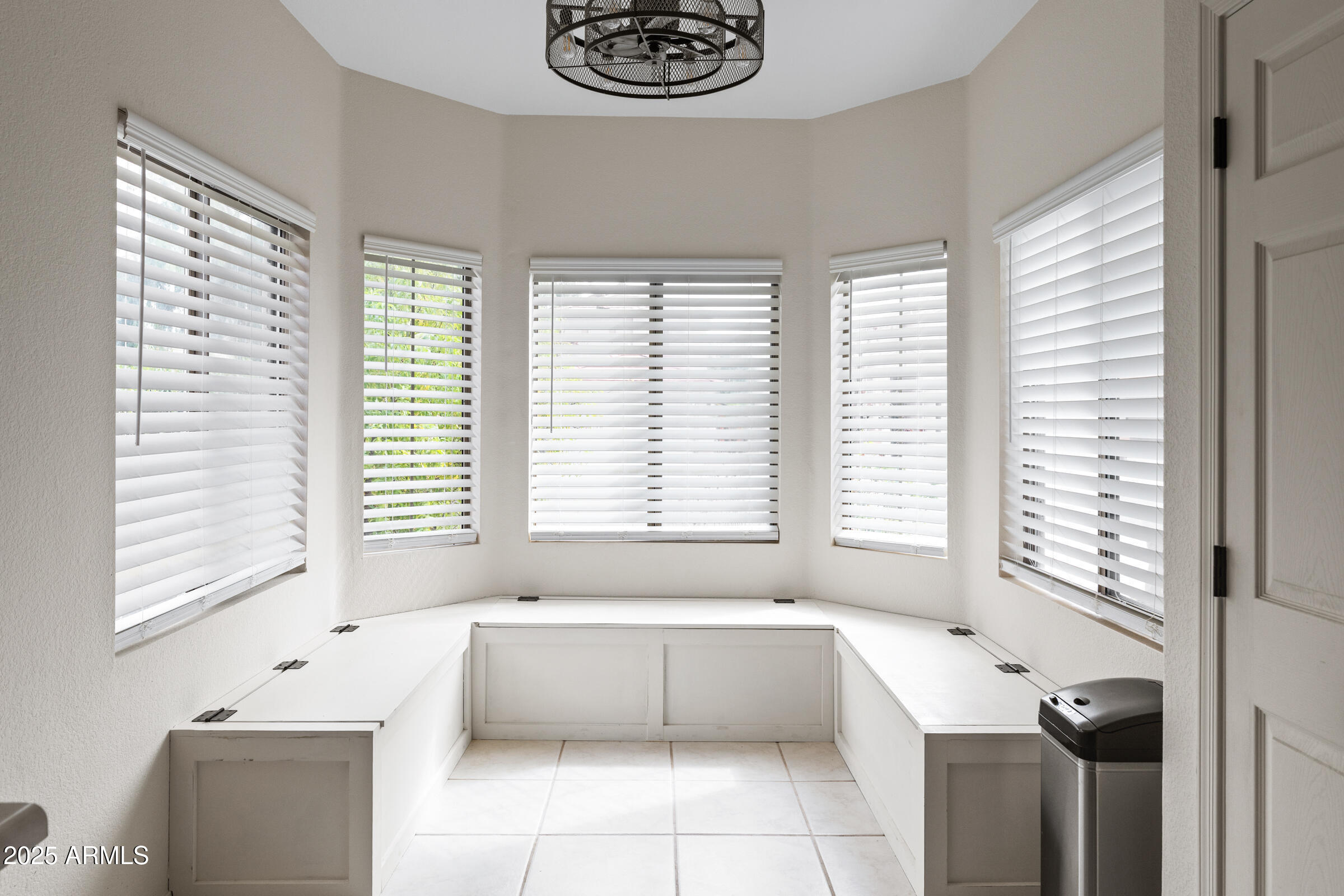 1140 South Rockwell Street Gilbert, AZ 85296 - Photo 13 of 29 a bathroom with a bathtub a shower and a window