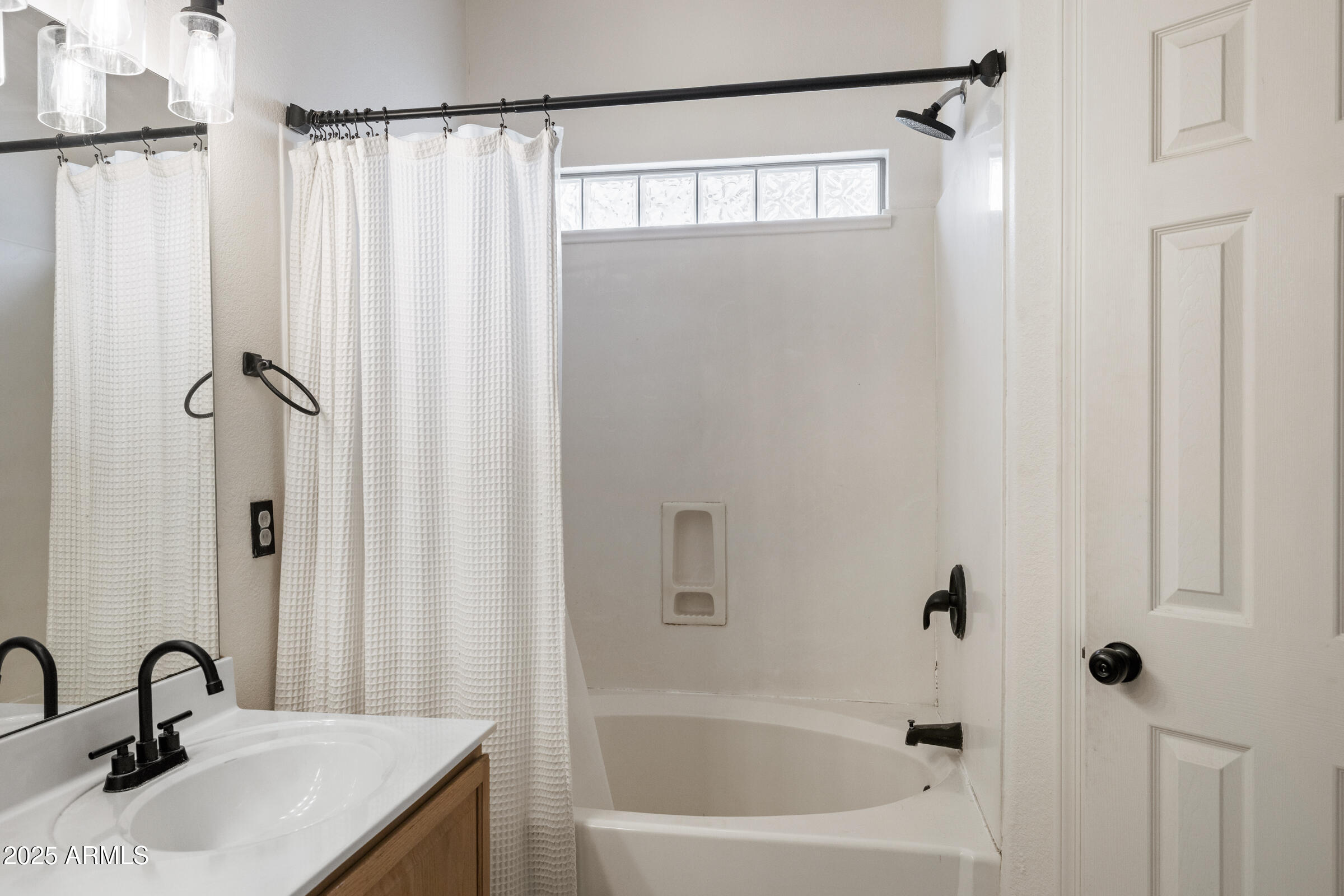 1140 South Rockwell Street Gilbert, AZ 85296 - Photo 21 of 29 a bathroom with a sink and a mirror