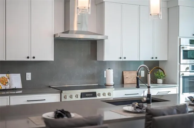 a front view of a house with yard and seating space