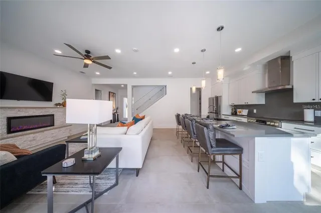 a bathroom with 2 sink tub and a mirror